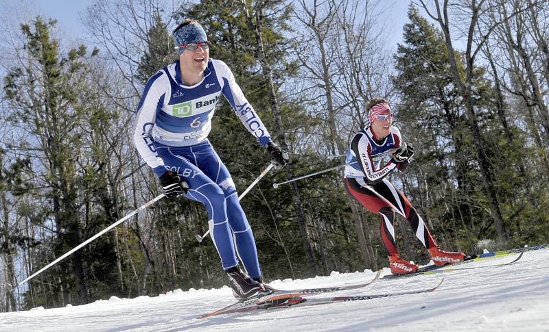 Colby College's Jake Barton, left, and St. Lawrence University's Will Frielinghaus, right, compete in the Colby College Winter Carnival 10K at Quarry Road Recreational Area in Waterville on Saturday.