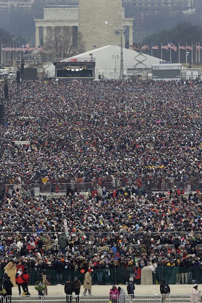 Crowds fill the National Mall to watch the ceremonial swearing-in of President Barack Obama at the U.S. Capitol during the 57th Presidential Inauguration in Washington, Monday, Jan. 21, 2013. (AP Photo/J. Scott Applewhite) Inauguration US Capitol