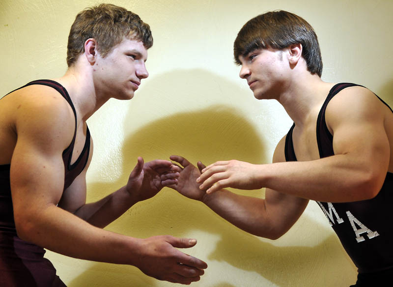 MUSTANG GRAPPLERS: Monmouth Academy wrestlers Stewart Buzzell, left, and James Gambino both won Mid-State Championships last weekend.