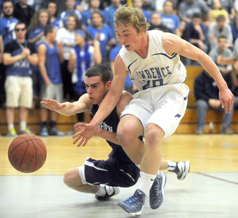 ON THE CHASE: Hampden Academy’s Nick Gilpin, left, and Lawrence High School’s Matt Saunders battle for the loose ball in the second quarter of the Broncos’ 51-35 win Tuesday in Fairfield. Hampden defeated Lawrence 51-35.