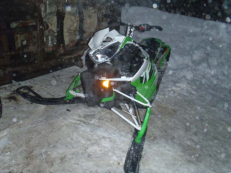 John Morris, 37, of Eustis was seriusly hurt when his snowmobile collided with a vehicle that had rolled over on Airport Road in Eustis at midnight Saturday. Morris is being treated at Central Maine Medical Center in Lewiston.