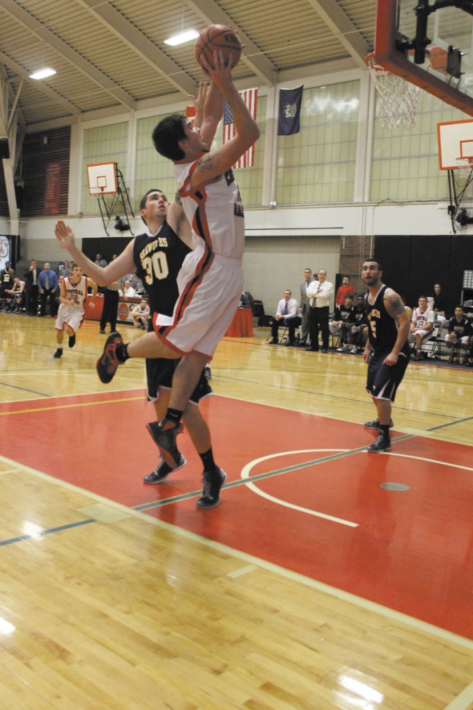 A NICE SWITCH: Central Maine Community College basketball player Jason Hughes was focused on football until concussions derailed his career. He has since put together a nice career with the Mustangs.