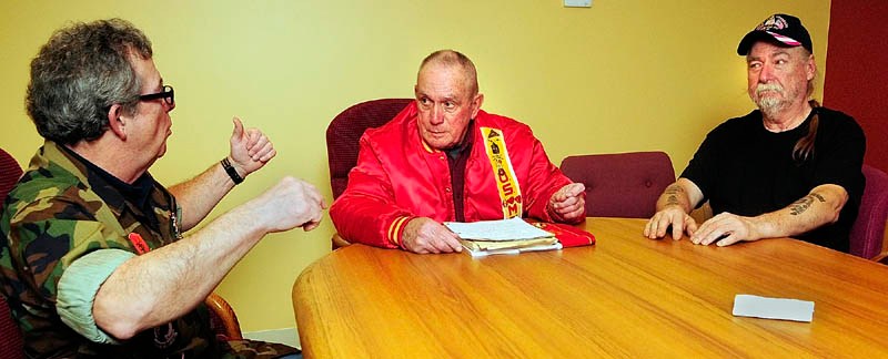 Marine Corps veterans Henry R. Gagne, left, Ralph Sargent and Bill Witt speak on Thursday about their service during the siege of Khe Sahn, during an interview in Augusta.