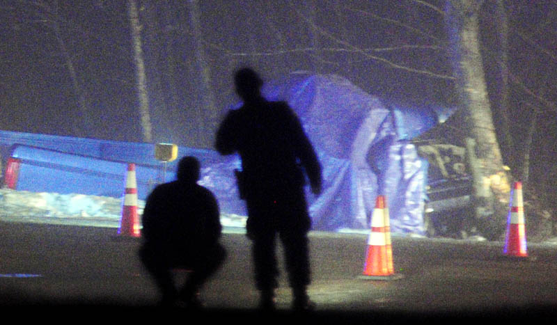 Officials investigate at the scene of one-vehicle crash Saturday, at P Ridge and Lane Roads in Readfield. Gabriel Soucy, 20, of Mount Vernon, was killed, and the 17-year-old driver of the pickup truck injured, in the accident, according to state police.