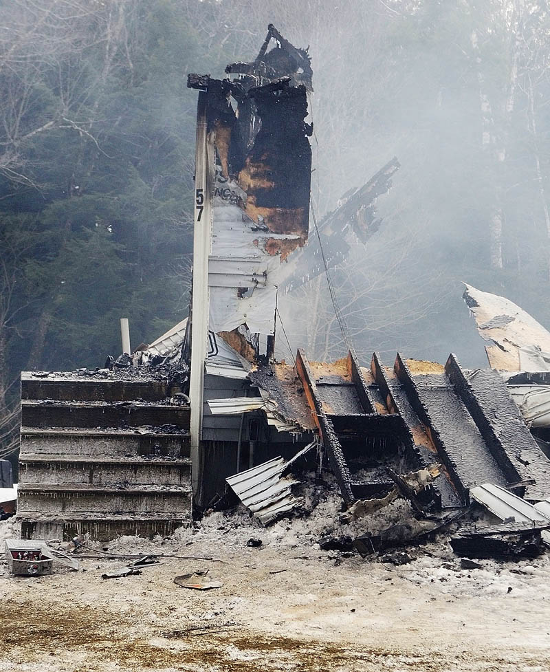 This home at 57 Poplar Point was still steaming at 1:03 p.m. on Friday after it was destroyed by an overnight fire in Mount Vernon.
