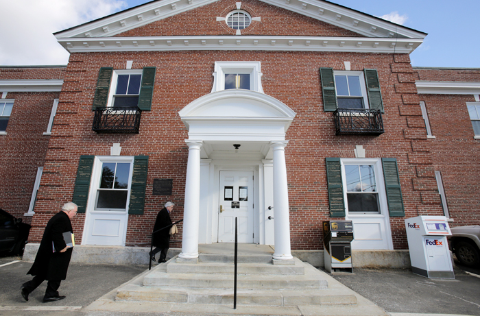 Attorney Daniel Lilley, left, and his client Mark Strong enter York County Superior Court in Alfred after returning from a lunch break on Tuesday.