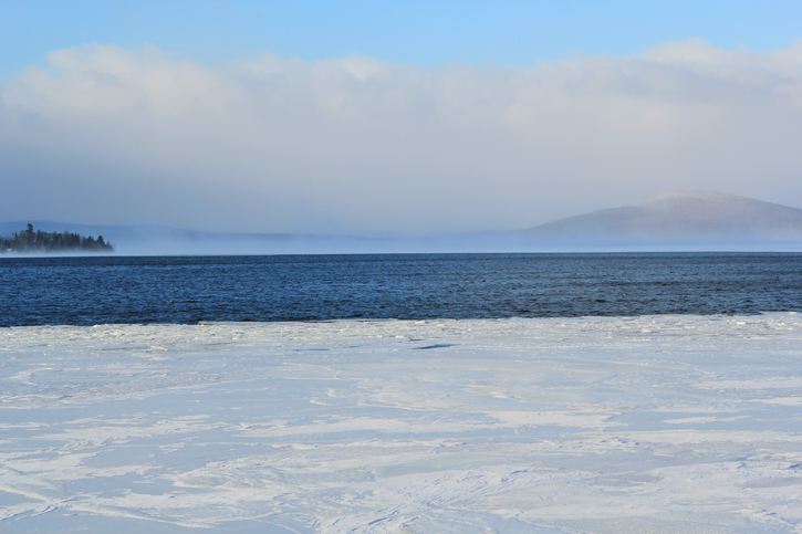 A Maine Warden Service photo of Rangeley Lake, where the search for three missing snowmobilers was suspended Tuesday due to bad weather.