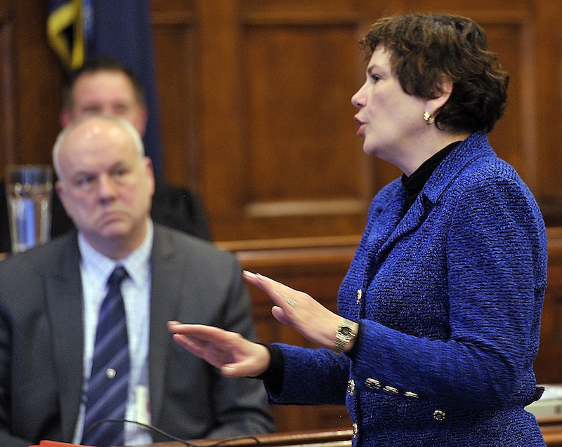 Flanked by the court reporter and the judge, District Attorney Stephanie Anderson gives her opening argument at the trial of Barry and Paula Spencer of Falmouth. Walter McKee, attorney for Barry Spencer, gives his opening arguments. The Spencers allegedly provided a place for underaged people to drink.