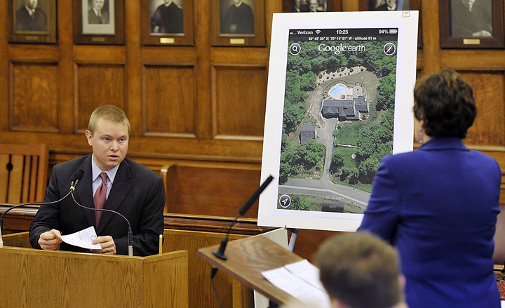 A key witness, Lucas Hallett, who was a Falmouth police officer at the time of the party and is now a Cumberland County sheriff's deputy, is questioned by District Attorney Stephanie Anderson during the trial of Barry and Paula Spencer.