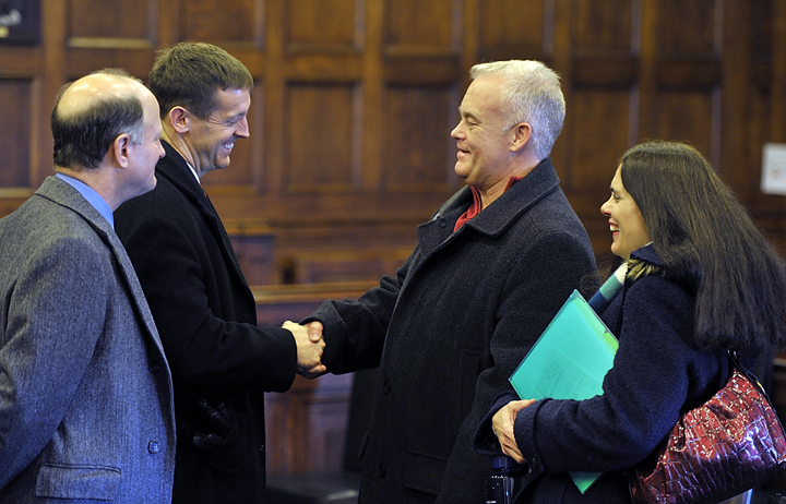Barry and Paula Spencer thank their attorneys after their trial ended with a deadlocked jury on Thursday.