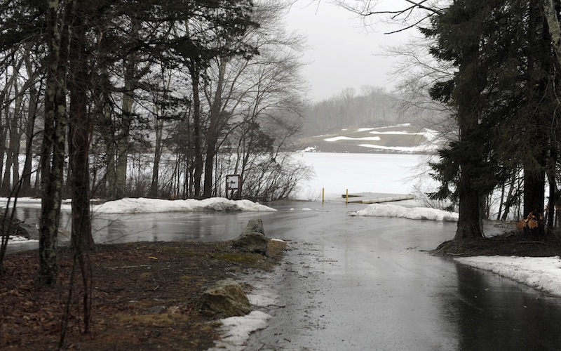 This Wednesday, Feb. 27, 2013 photo shows the state boat launch at the end of Lake of Isles Road in Preston, Conn. State police said the bodies of 6-month-old Ashton and 2-year-old Alton Perry and their grandmother, Debra Denison, 47, were found Tuesday night in Denison's van at the boat launch. State police called the deaths a double murder-suicide Wednesday, saying they believe Denison shot the boys and herself. (AP Photo/The Day, Sean D. Elliot)