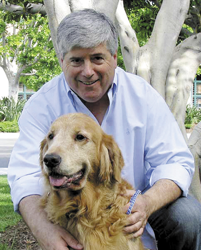 David Rosenfelt with his golden retriever.