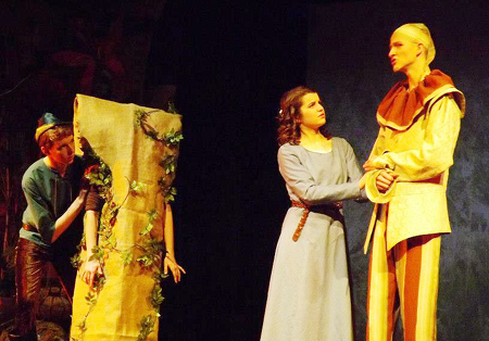From left: Evan LaChance of Vassalboro, Rachael Richie Keyes (the tree) of Palermo, Charlotte MacDonald of West Gardiner, and Ben Garthoff of Jefferson perform in Shakespeare’s “As You Like It” during a recent show at Cumston Hall in Monmouth. The show, presented by the Southern Maine Association of Shakesparean Homeschoolers, will also be performed tonight and Friday at 6:30 p.m., and Saturday at 2 p.m.