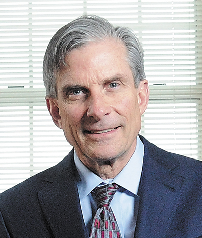 William D. Adams, president of Colby College