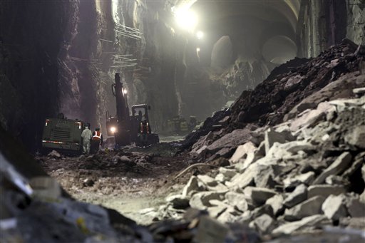 Contractors work on the East Side Access project beneath midtown Manhattan, in New York. The East Side Access is one of three bold projects under New York that will expand what's already the nation's biggest mass-transit system by 2019.