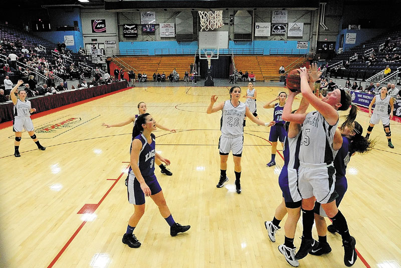 Rangeley's Taylor Esty goes up for a shot during a Western Class D quarterfinal Tuesday against Islesboro at the Augusta Civic Center.