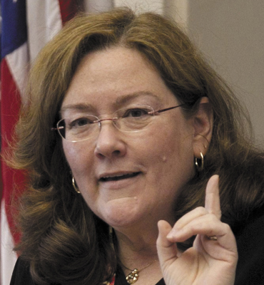 Maine Chief Justice Leigh Saufley gestures during her annual State of the Judiciary address, Thursday, at the State House in Augusta.