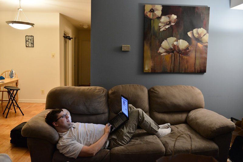 Travis Lerol uses his 3-D printer to create plastic rifle parts at his home in Glen Burnie, Md. “There’s really no one controlling what you do in your own home,” he said.