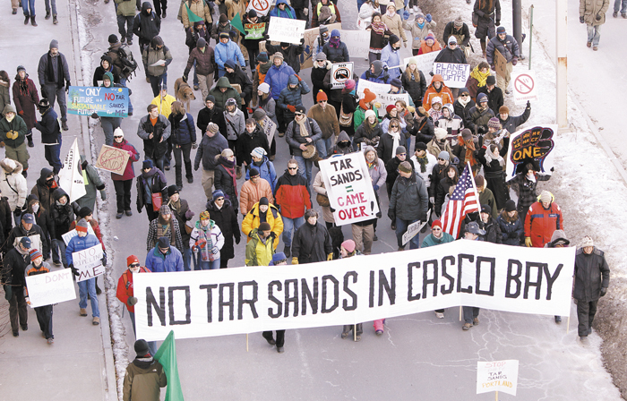People march to the Maine State Pier in Portland on Jan. 26 to attend a rally protesting the use of the Portland to Montreal pipeline to send tar sands crude oil to Casco Bay.