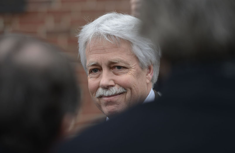 Mark Strong Sr. speaks with the media outside the courthouse following his trial Wednesday, March 6 2013. Strong was found guilty of 12 counts of promotion of prostitution and one count of conspiring to promote prostitution.