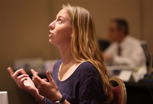 Deckhand Anna Sprague describes sitting on the deck waiting to abandon ship as she testifies during the U.S. Coast Guard's February hearing into the sinking of the HMS Bounty during Hurricane Sandy.
