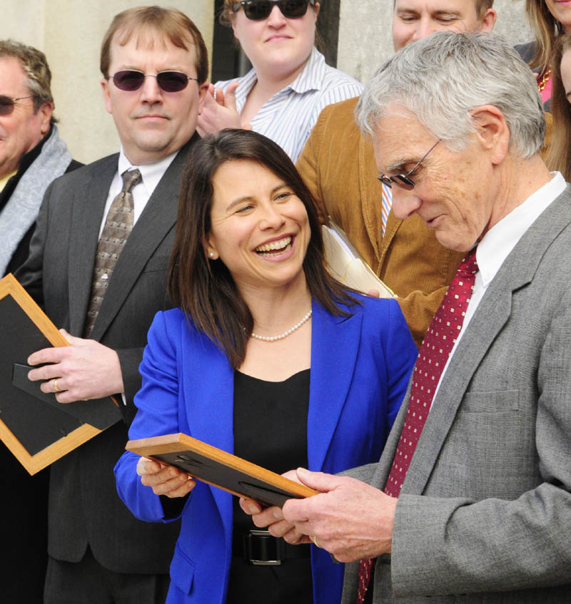 Kennebec and Somerset County District Attorney Maeghan Maloney, center, announced Brent Davis, left, would be first assistant and Fernand LaRochelle, right would be deputy district attorney during a news conference on Thursday outside the Kennebec County Superior Court House in Augusta.