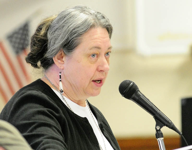 Wanda Burns-Macomber, chairwoman of the Board of Selectmen, participates in the debate during the Pittston town meeting on Saturday.