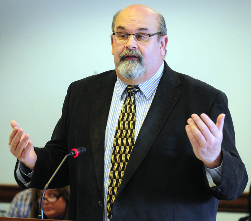 Augusta City Councilor David Rollins answers a question while testifying in favor of L.D. 498 before the Legislature's Criminal Justice and Public Safety Committee on Friday, at the State House in Augusta.