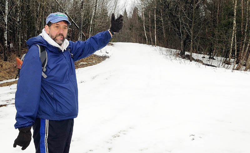 Bill Seekins on Thursday talks about plans for improvements during a walking tour of Thurston Park in China.