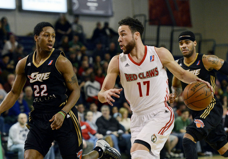 Red Claws guard Jeremiah Rivers pushes the ball up the court while chased by Erie’s Demonte Harper during Sunday’s D-League game at the Portland Expo. Rivers had 11 points and seven rebounds in Maine’s 102-101 win.