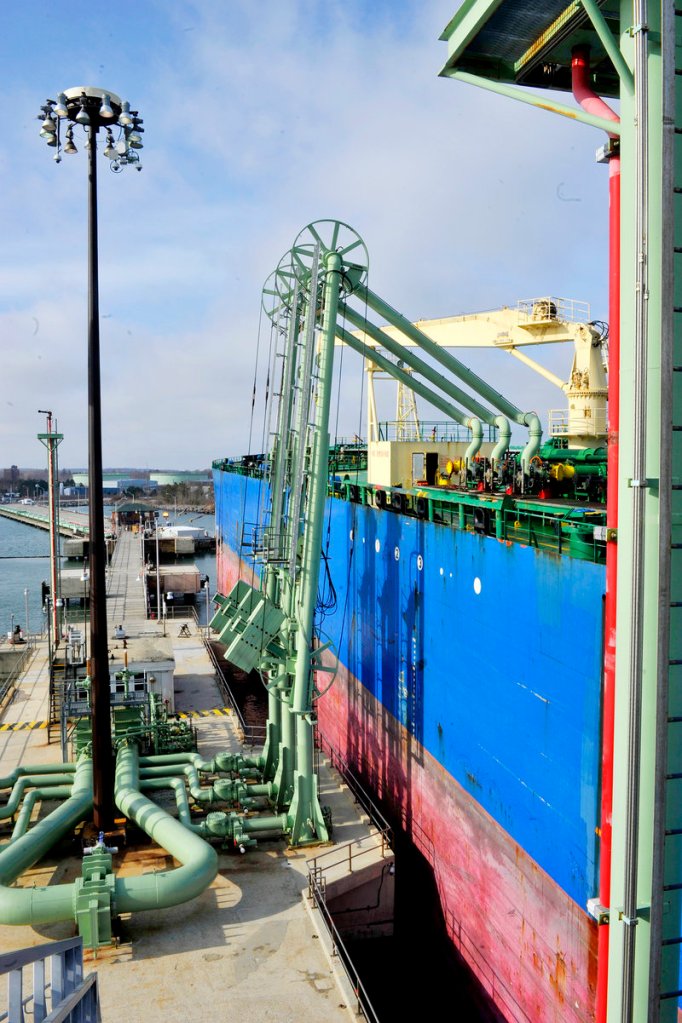 Unloading arms remove oil for storage from the oil tanker HS Electra at Portland Pipe Line’s pier facility in South Portland.