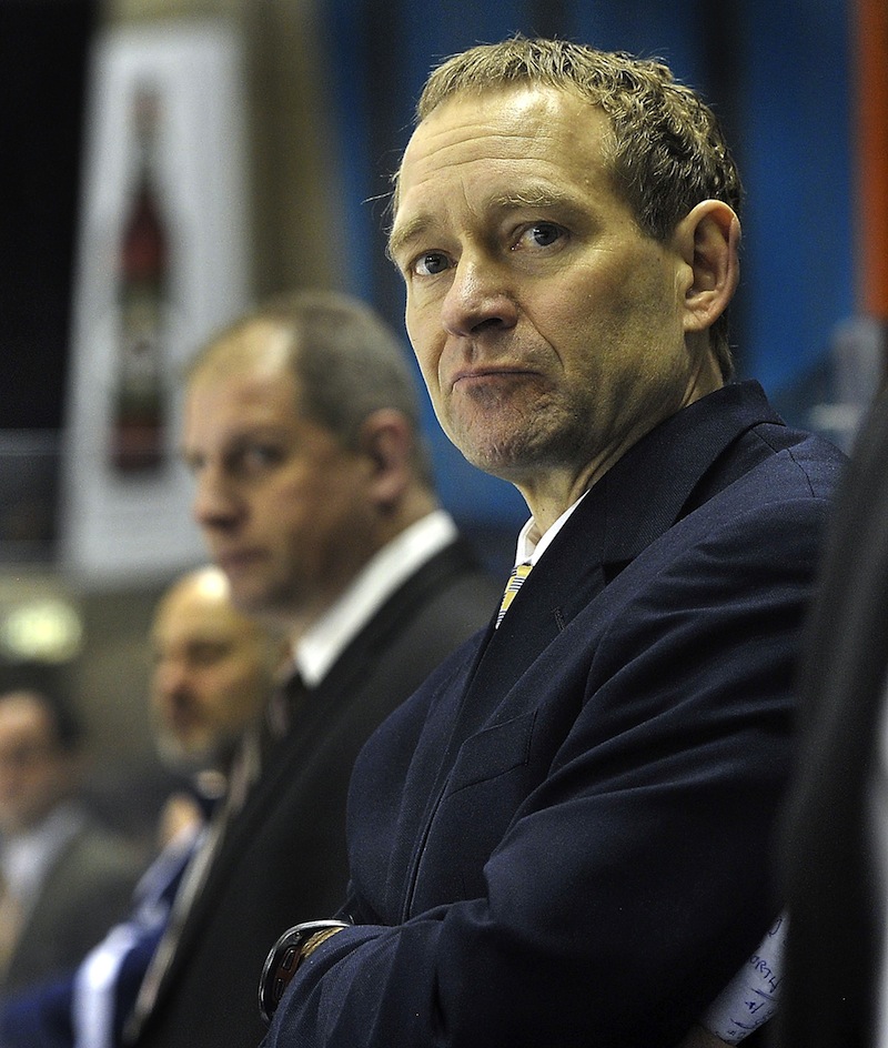 University of Maine head hockey coach Tim Whitehead looks on during a Black Bears game in January. Whitehead was fired Tuesday after 12 years at the program's helm.