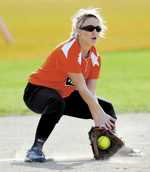 TWO HANDS: Gardinerl’s Lilly Chepke grabs a grounder against Nokomis on Monday in Gardiner.