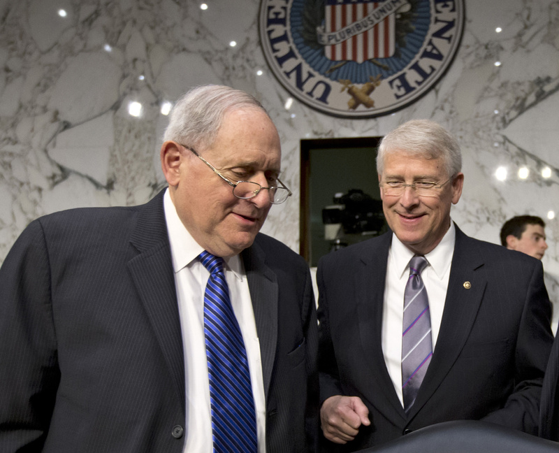 Senate Armed Services Committee Chairman Sen. Carl Levin, D-Mich., left, and Sen. Roger Wicker, R-Miss., talk on Capitol Hill in Washington on Wednesday. A letter addressed to Wicker, believed to be poisoned with ricin, was intercepted at a mail facility outside the capital earlier this week. Levin issued a statement saying an aide in his Saginaw, Mich., office had also received a suspicious-looking letter.
