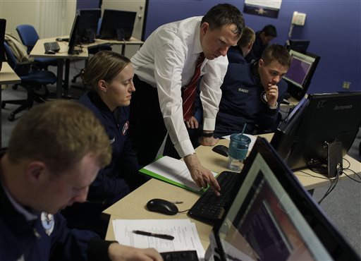 Martin Carlisle, a computer science professor at the Air Force Academy and director of the school's Center for Cyberspace Research, instructs cadets in cyber warfare, at the U.S. Air Force Academy, in Colorado Springs, Colo.