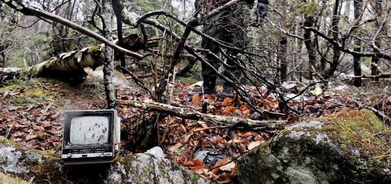 Staff photo by Andy Molloy A television found at Christopher Knight's camp on Tuesday April 9, 2013 in a remote, wooded section of Rome. Police believe Knight, who went into the woods near Belgrade in 1986, was a hermit who committed hundreds of burglaries to sustain himself.