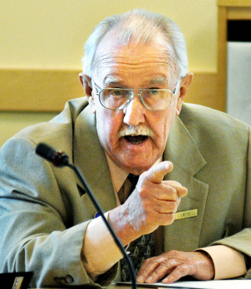 Rep. James Campbell, an independent from Newfield, castigates Sen. Andre Cushing, a Republican from Hampden, during a hearing Monday about proposed right-to-work legislation. The Legislature's Labor, Commerce, Research and Economic Development Committee considered two bills that would prohibit employee contracts from requiring union membership or payment of union dues.