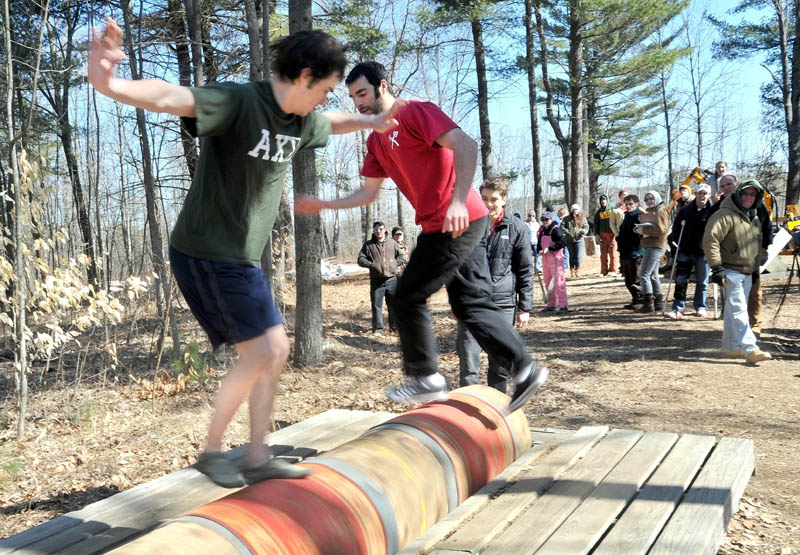 The burling competion at Colby College's annual Muddy Jack & Jill Meet in Waterville on Saturday.