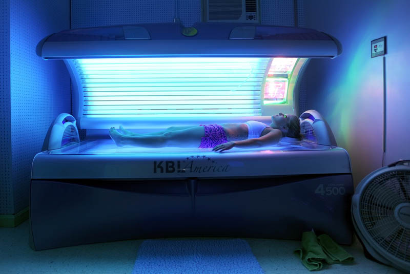 Brandy Armour, 22, of Burnham, soaks up the rays during a tanning session at Tropical Sunsations at 108 Main Street in Fairfield this winter.