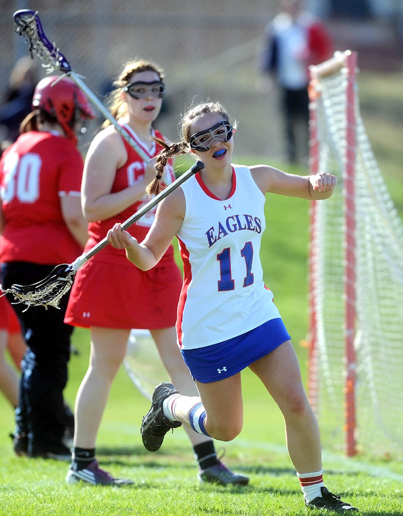 THAT’S A GOAL: Messalonskee’s Sydney Gagne (11) celebrates her first period goal during the Eagles’ 10-9 win over Cony on Thursday at Messalonskee High School in Oakland.