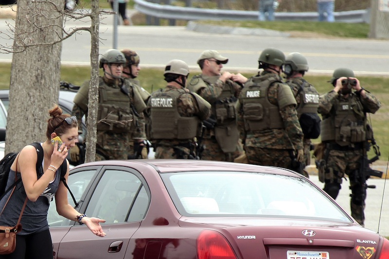 UMASS-Dartmouth students were evacuated from campus on Friday, April 19, 2013as local and state officials investigate the dorm room of Dzhokhar Tsarnaev, 19, one of the two suspects wanted for the Boston Marathon bombing on Monday. Dzhokhar Tsarnaev was registered as a student at the University of Massachusetts Dartmouth, the school said. The campus closed down along with colleges around the Boston area. (AP Photo/Standard Times, Peter Pereira) crime;terrorism;bomb;investigation;police;military