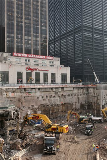 Construction workers and equipment excavate the southeastern corner of the World Trade Center site in this Jan. 8, 2008, photo taken in New York. About 60 truckloads of debris that could contain tiny human bone fragments have been unearthed. That material is now being transported to a park built on top of the former Fresh Kills landfill on Staten Island. City officials say investigators will spend 10 weeks attempting to identify the remains.