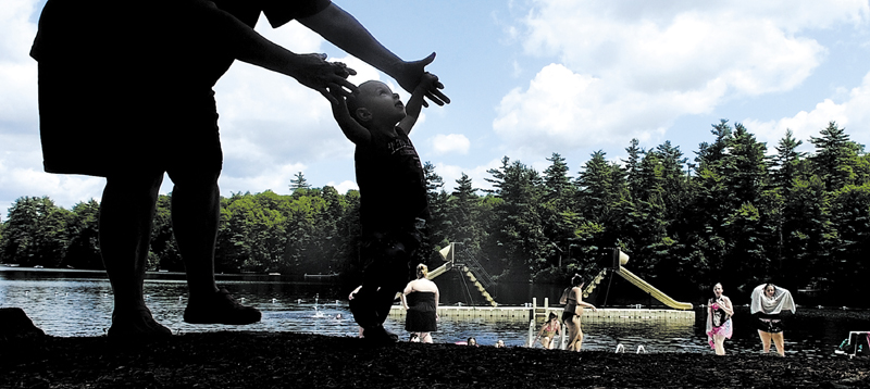Cheryl Barnard, of Augusta, walks with her great-nephew, Tyler Poulin , of St.-Ephrem De Beauce, Quebec. on May 30, 2012 at Bicentennial Nature Park in Augusta.