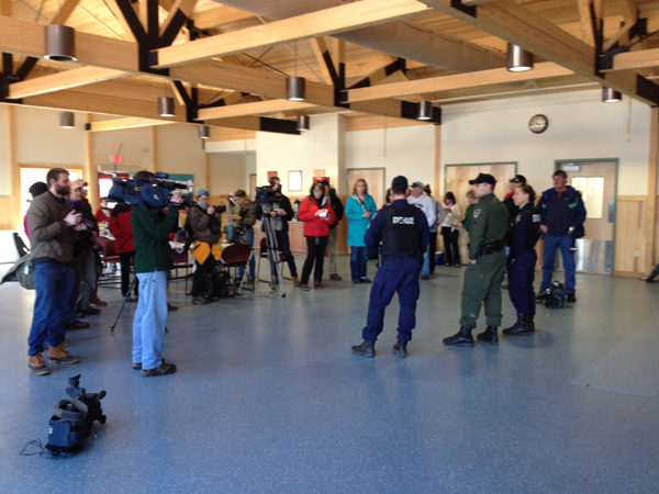 Sgt. Peter Michaud, left, Sgt. Terry Hughes and Trooper Diane Perkins-Vance brief media at Pine Tree Camp before going to Christopher Knight's campsite Thursday.