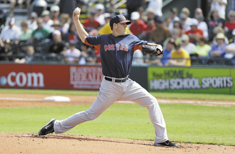 Boston starting pitcher John Lackey, shown in February, pitched for the Sea Dogs on Monday as he recovers from an arm injury.