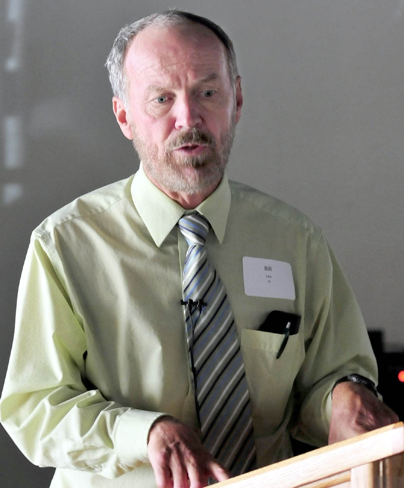 Bill Lee, who teaches at Colby College and is Waterville's city solicitor, talks to the Mid-Maine Global Forum on Tuesday about a trip he took recently with Colby students to Cuba.