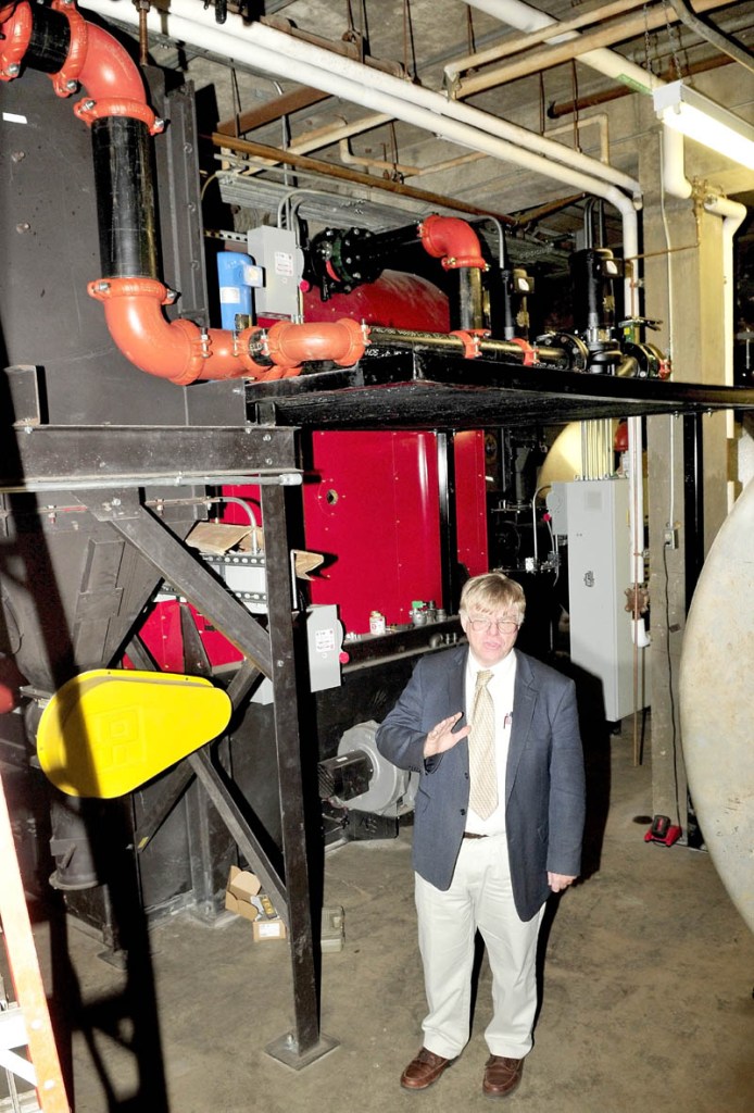 Brent Colbry speaks in front of the new wood pellet boiler system inside the Skowhegan Area High School on Jan. 103. Colbry, superintendent of School Administrative District 54, said about half of a proposed $1.48 million district budget increase will be paid as tuition to two charter schools, Cornville Regional Charter School and the Maine Academy of Natural Sciences in Fairfield.