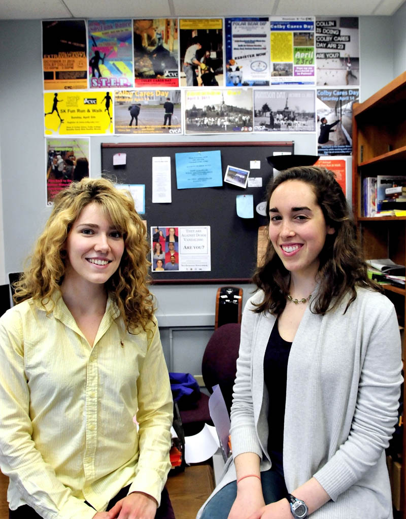 Students Amanda Lavigueur, left, and Madison Louis, inside the Colby College Volunteer Center in Waterville on Sunday. The center is hosting the college's largest annual volunteering event, Colby Cares Day, on Saturday.