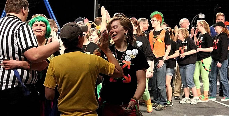 Messalonskee High School's robotics club celebrates it first-place finish at the Pine Tree FIRST Robotics Competition Saturday in Lewiston.