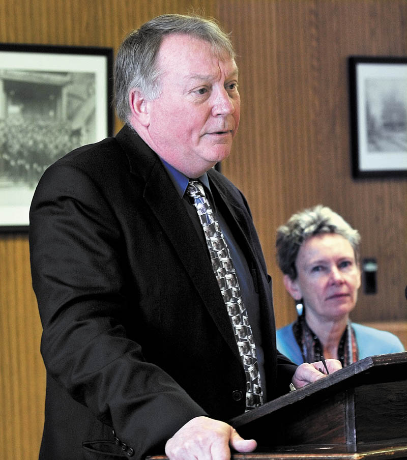 Eric Haley, Alternative Organization Structure 92 superintendent, speaks about state budget cuts in January 2012. Haley called this year's school budgeting process, marked by uncertainty over state funding, one of the worst budget years he has ever seen. Waterville Mayor Karen Heck is in the background.